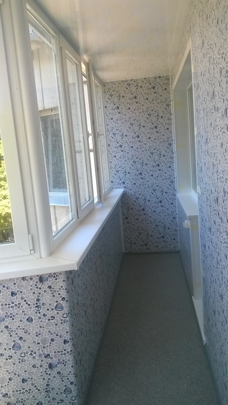Отделка балкона пластиковыми панелями