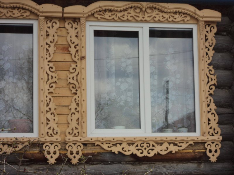 Прорезная домовая резьба наличники