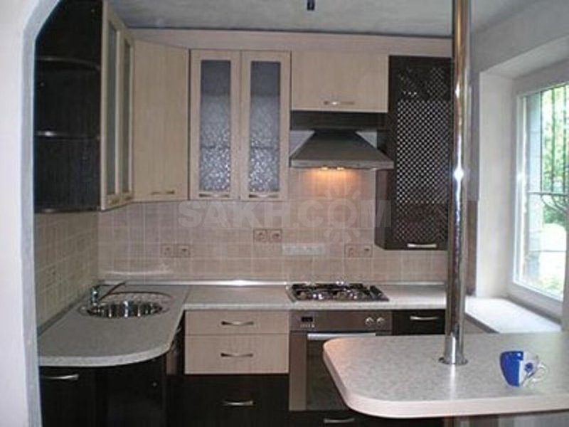 Кухонные гарнитуры угловые с барной стойкой